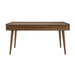Crate & Barrel Tate 60" Walnut Desk with Outlet shown from the front, featuring a spacious walnut desktop, three storage drawers, and tapered mid-century modern legs