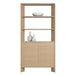 Crate & Barrel Terrazza 38" Natural Solid Oak Wood 2-Shelf Storage Bookcase Cabinet styled with decorative vases on the shelves and cabinet top