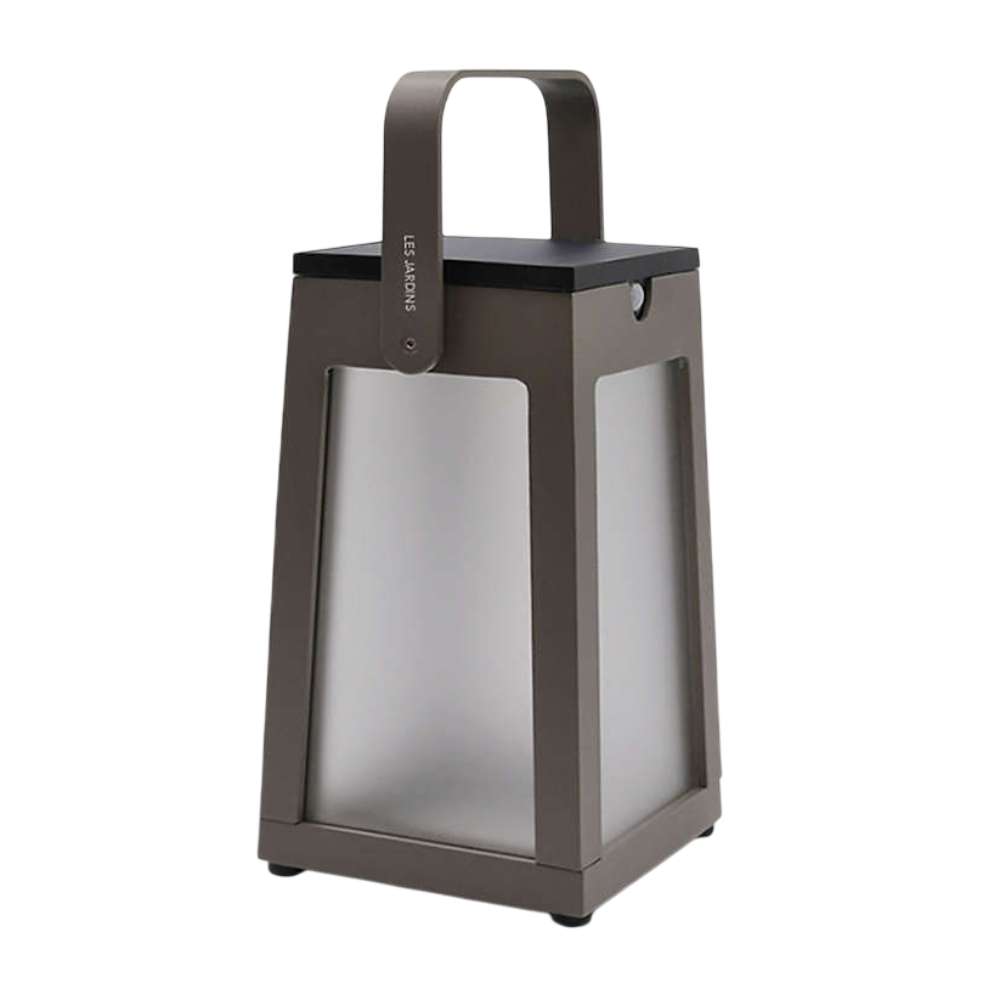 Crate & Barrel Tinka Taupe Aluminum Portable Solar LED Outdoor Lantern 10.5" features a taupe metal frame, frosted panels, and a top carrying handle