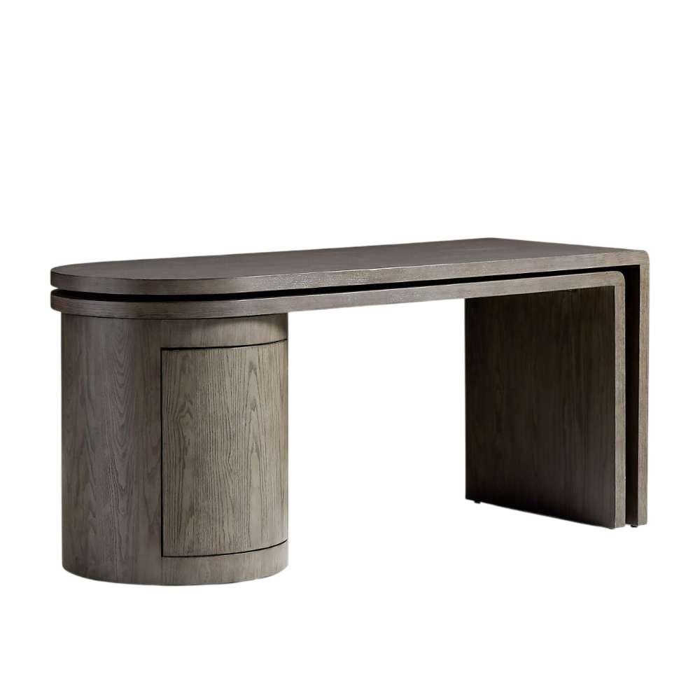 Crate & Barrel Twist 64" Grey Ash Rotating Large Desk with Storage featuring a rounded storage cabinet integrated into the desk design