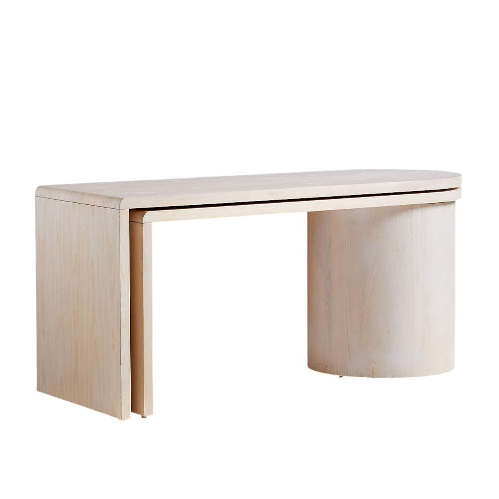 Crate & Barrel Twist 64" Whitewashed Ash Rotating Large Desk with Storage isolated on a white background highlighting its curved design and built-in storage