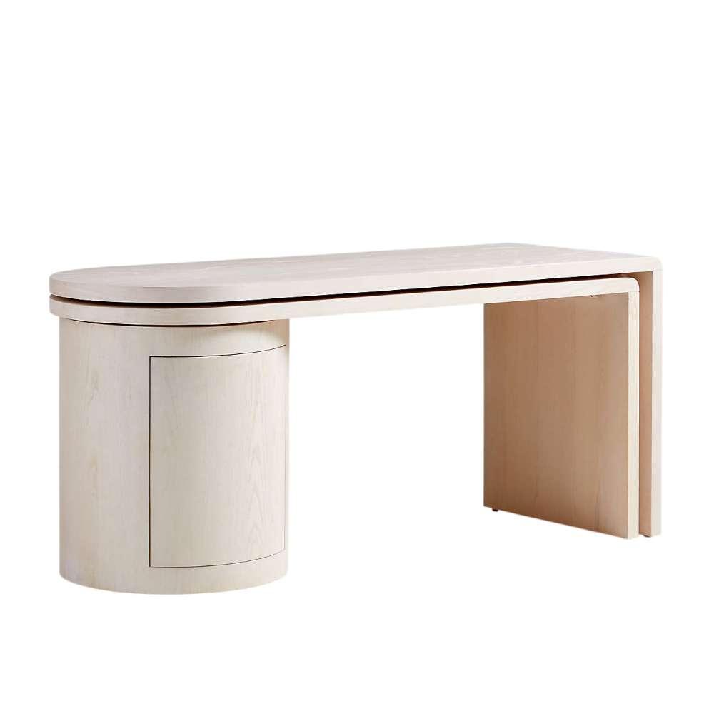 Crate & Barrel Twist 64" Whitewashed Ash Rotating Large Desk with Storage shown in a compact configuration with a curved desktop and cylindrical storage cabinet