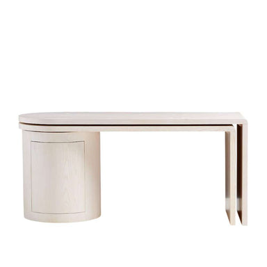 Crate & Barrel Twist 64" Whitewashed Ash Rotating Large Desk with Storage shown in a streamlined profile with the rotating section neatly tucked in