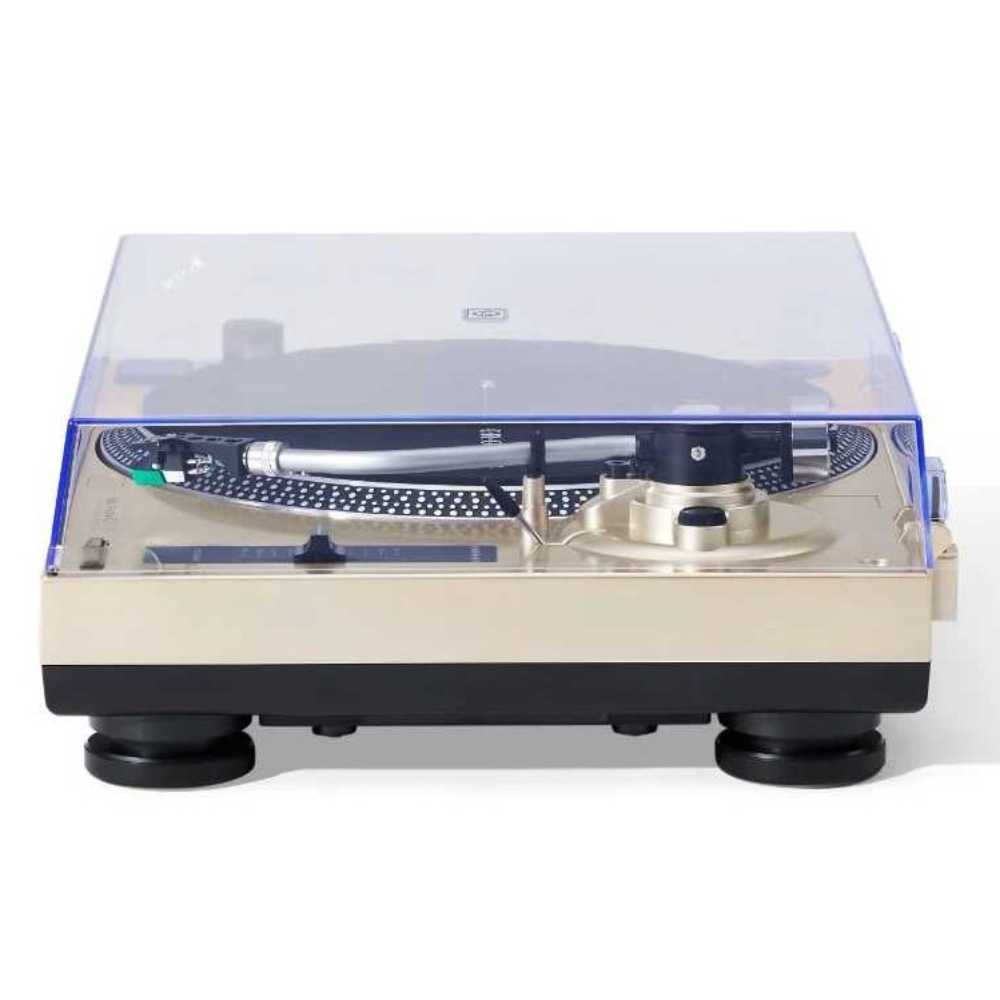 Crosley C100BT Bluetooth Turntable - Champagne is seen from the side with its clear dust cover closed