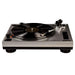 Crosley C100 Turntable - Silver is presented in a close-up view, displaying its spinning vinyl and precise tonearm