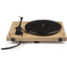 Crosley C10 Turntable - Natural is displayed without a record, showing its felt slipmat on a natural wood base with a black tonearm and audio components