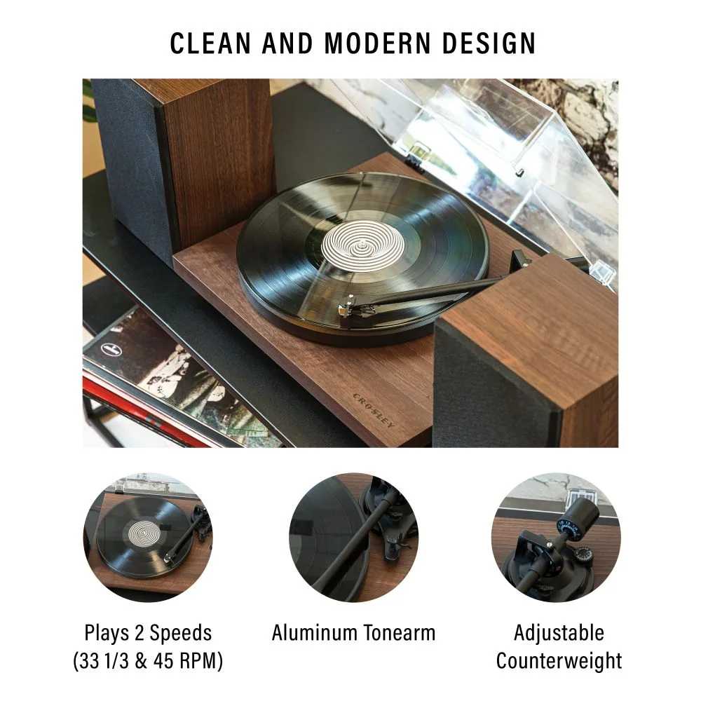 Crosley C62C Turntable System - Walnut showcases a sleek design with a vinyl record playing on its two-speed setup, featuring an aluminum tonearm and adjustable counterweight