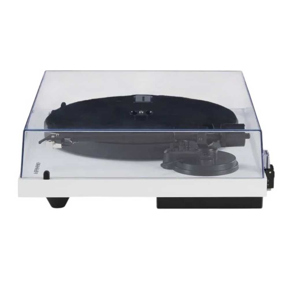 Crosley C6 Bluetooth Turntable - White is displayed from a side angle with its dust cover closed