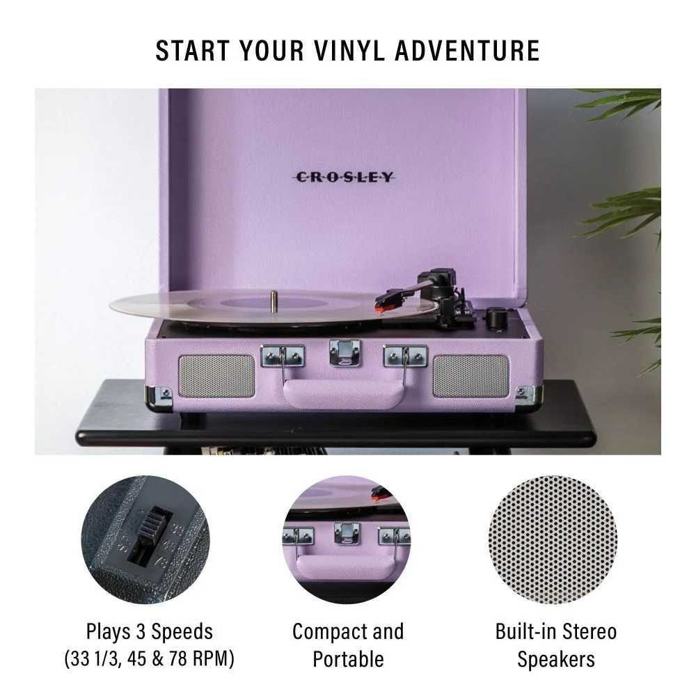 Crosley Cruiser Plus Portable Turntable with Bluetooth InOut - Lavender is open, highlighting its built-in stereo speakers and portable suitcase-style build