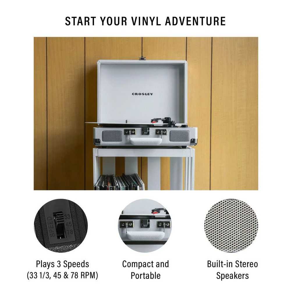 Crosley Cruiser Plus Portable Turntable with Bluetooth InOut - White Sand is shown with its lid open, revealing built-in speakers and a compact, vintage design