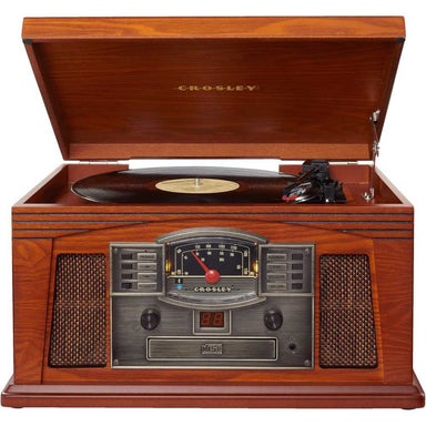 Crosley Lancaster Entertainment Center - Paprika is shown playing a vinyl record with its wooden lid open, highlighting the vintage design and multifunctional panel