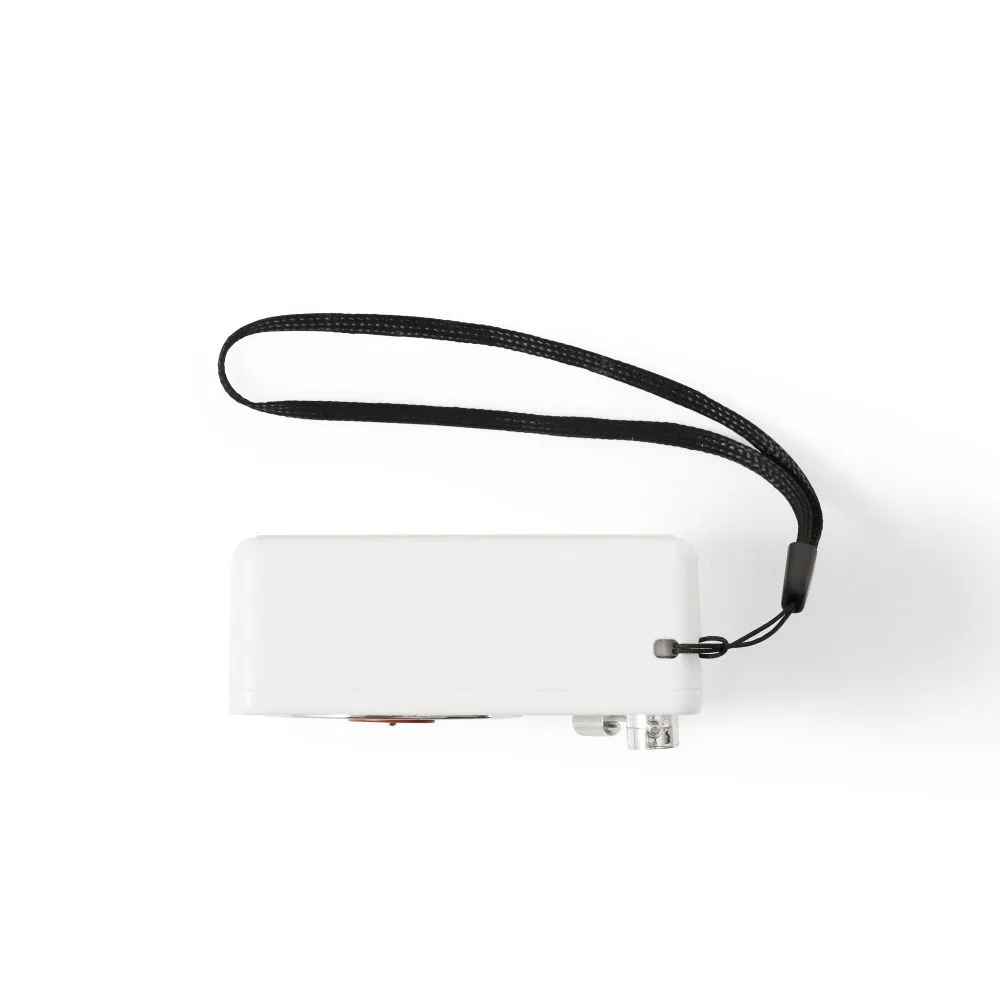 Crosley Mini Turntable Bluetooth Speaker - White is displayed from the top with its sleek black strap