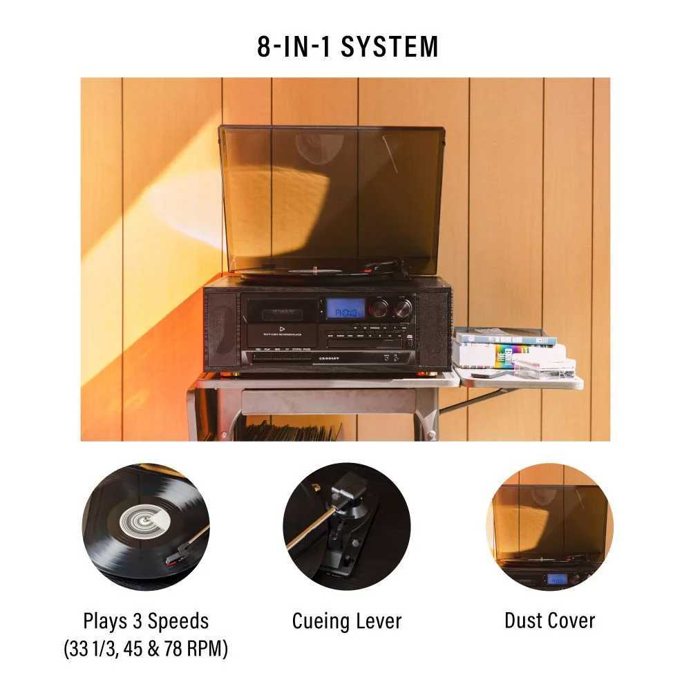 Crosley Ridgemont Entertainment Center - Black is an 8-in-1 music system with a turntable, CD player, cassette player, Bluetooth, AMFM radio, aux input, built-in speakers, and a headphone jack