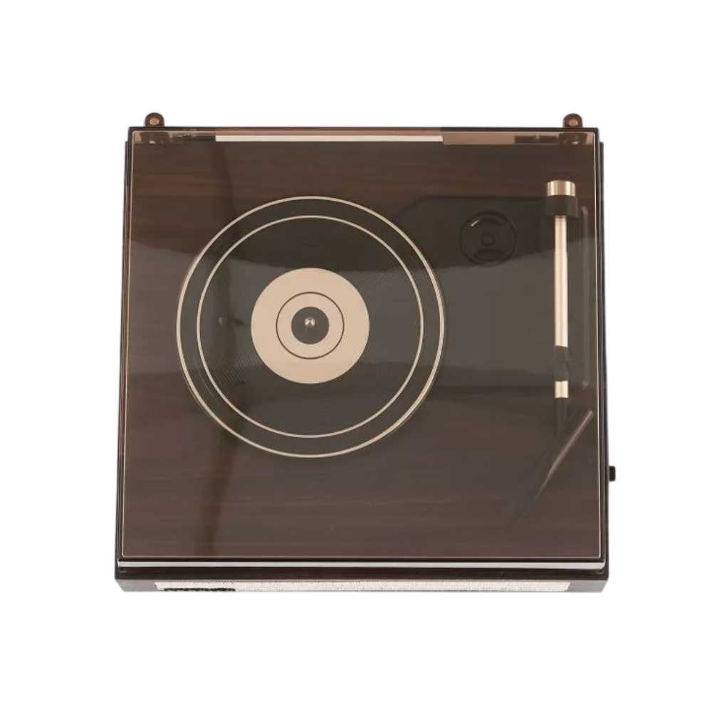 Crosley Scout Turntable - Walnut is shown from above with the dust cover closed, highlighting its sleek, modern design with a visible platter and tonearm