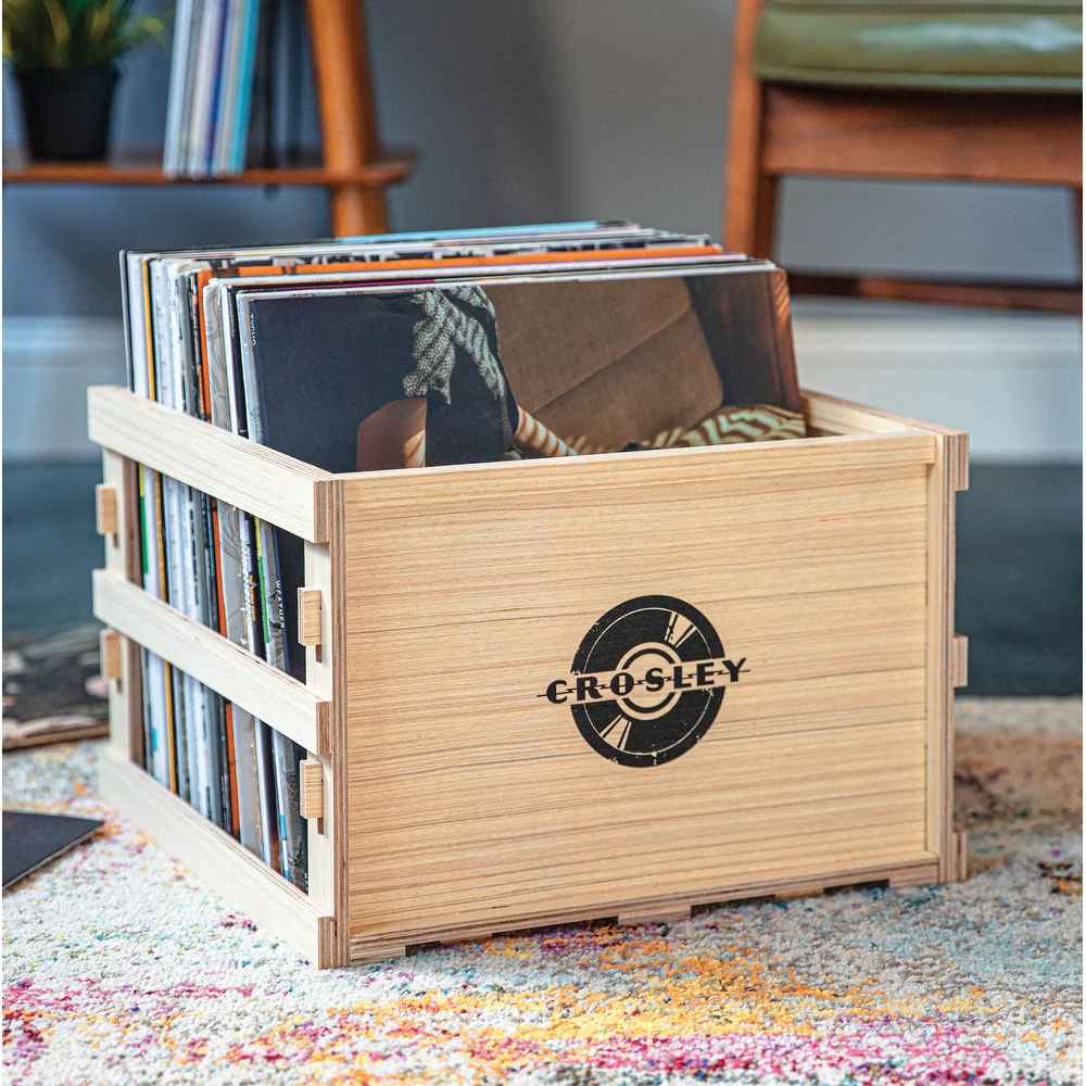 Crosley Square Vinyl Record Storage Crate - Natural is shown filled with vinyl records