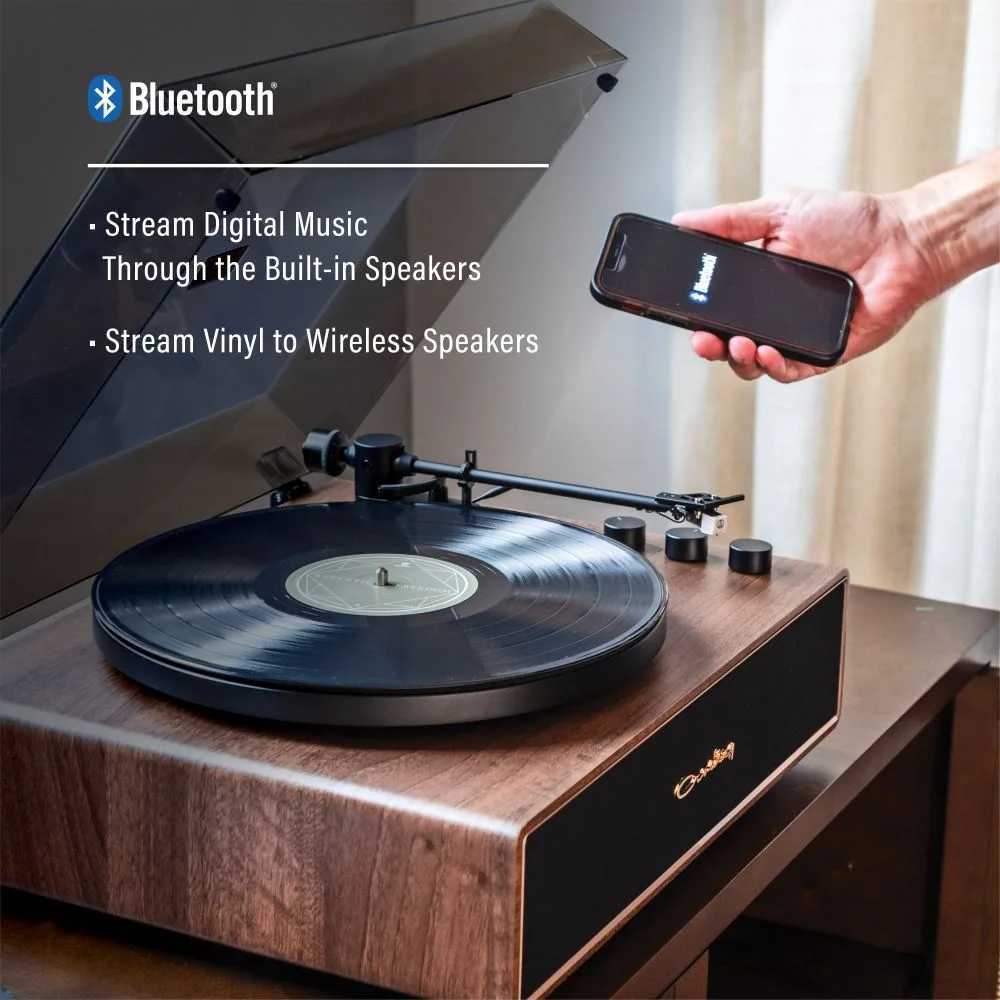 Crosley Stave Record Player - WalnutGold highlights Bluetooth connectivity, streaming vinyl or digital music effortlessly through wireless speakers