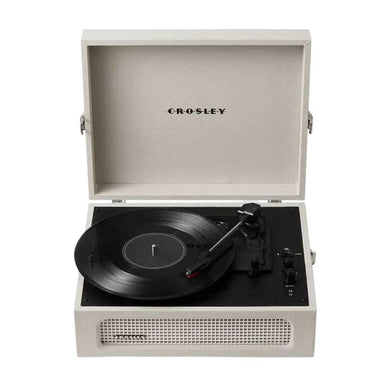 Crosley Voyager Portable Turntable with Bluetooth Out - Dune is shown with a classic black vinyl record spinning