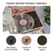 Crosley Voyager Portable Turntable with Bluetooth Out - Floral features a floral design, a transparent vinyl record on the platter, and a compact build