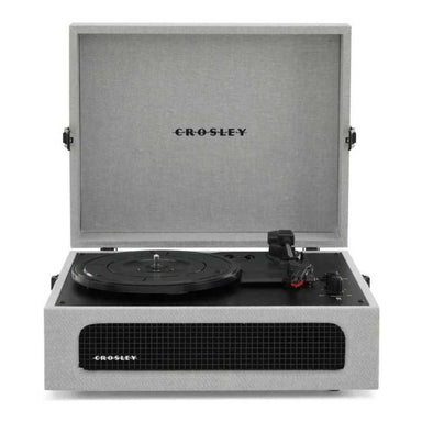 Crosley Voyager Portable Turntable with Bluetooth Out - Gray features a minimalist design with its lid open, showcasing the turntable’s controls and stylus