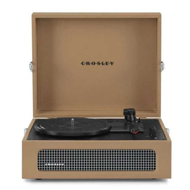 Crosley Voyager Portable Turntable with Bluetooth Out - Tan is presented front-facing with its open lid, built-in speaker grille, and tonearm in a minimalistic tan design