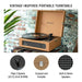 Crosley Voyager Portable Turntable with Bluetooth Out - Tan is shown playing a vinyl record, highlighting its vintage design, built-in stereo speakers, and compact portability