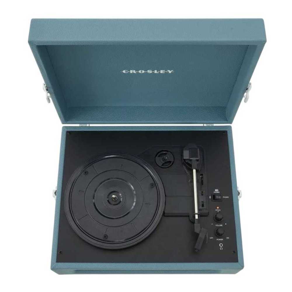 Crosley Voyager Portable Turntable with Bluetooth Out - Washed Blue is shown open, revealing the turntable platter, tonearm, and control knobs inside its washed blue case