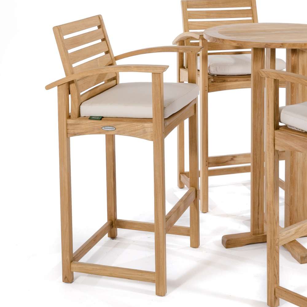 Cushioned teak bar stool paired with a round high table from Westminster Teak Somerset 5pc Teak High Bar Set is displayed on a clean background