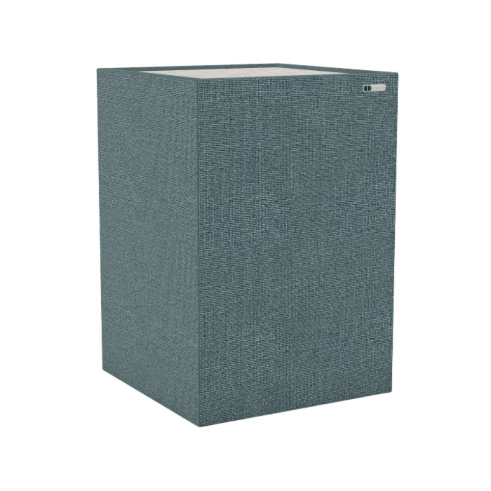 Demi Ronay GIK Acoustics Soffit Corner Bass Trap in a muted blue-gray fabric finish for improved low-frequency sound control