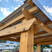 Detailed corner joint of Outdoor Living Today Western Red Cedar 8x5 Grill Gazebo highlights its solid cedar beam construction and roof support