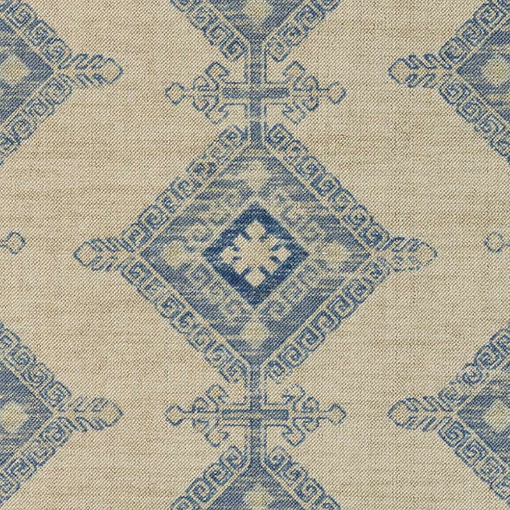 Detailed look at Momeni Anatolia Indoor Rug - ANA-10 Ivory reveals its diamond-shaped motifs with classic blue accents on ivory