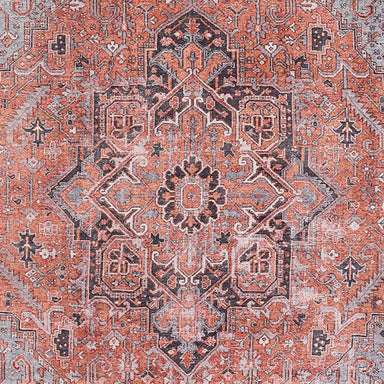 Detailed view of Momeni Afshar Indoor Rug - AFS36 Copper shows its central medallion with ornate floral and geometric patterns