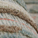 Detailed view of Momeni Allegro Indoor Rug - ALL-3 Multi shows its raised textured fibers and plush feel