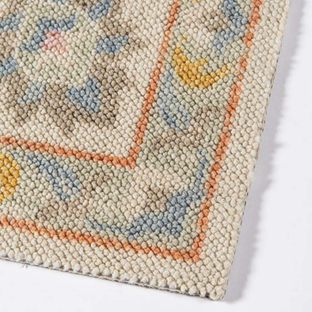 Detailed view of the corner edge of Momeni Anatolia Indoor Rug - ANA-8 Light Blue
