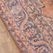 Detailed view of the intricate floral and vine motifs along the edge of Momeni Afshar Indoor Rug - AFS11 Copper