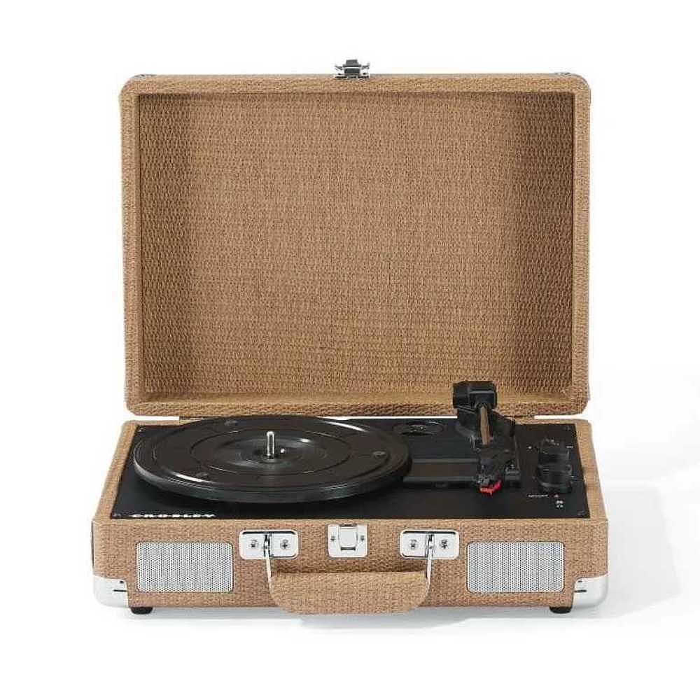 Displaying the Crosley Cruiser Plus Portable Turntable with Bluetooth InOut - Basketweave, the turntable’s open lid