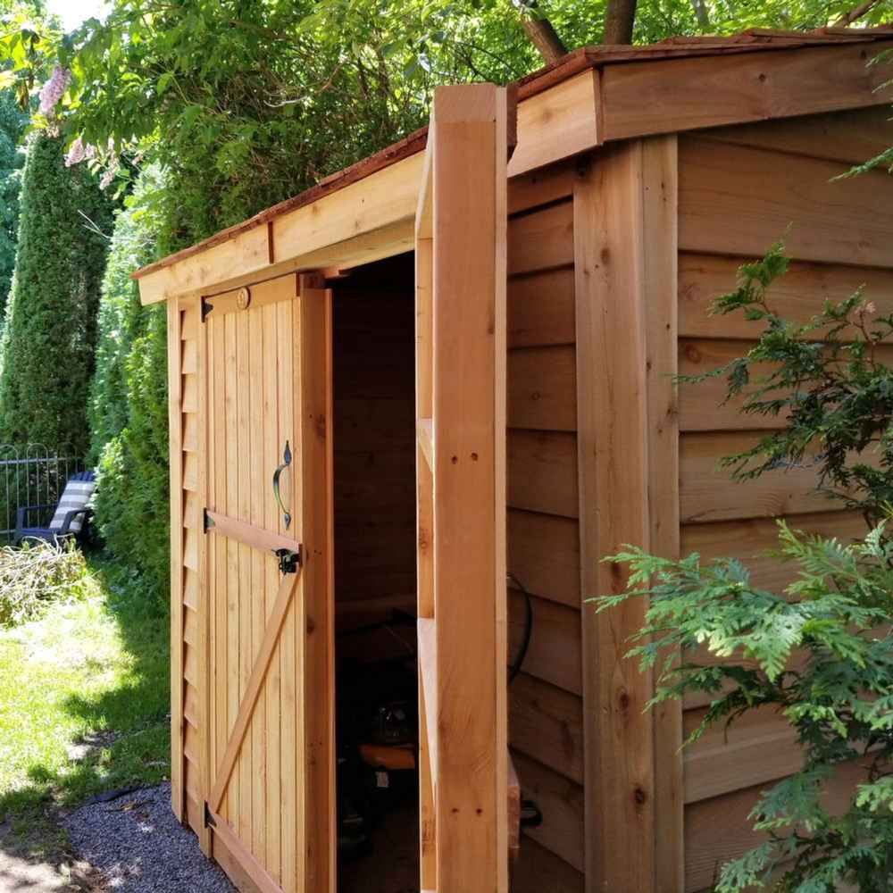 Double Door Cedar Roof Outdoor Living Today 8×4 SpaceSaver Lean-To Cedar Shed is shown from an angle with one sliding door partially open
