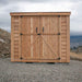 Double Door Cedar Roof Outdoor Living Today 8×4 SpaceSaver Lean-To Cedar Shed stands with its sliding double doors closed