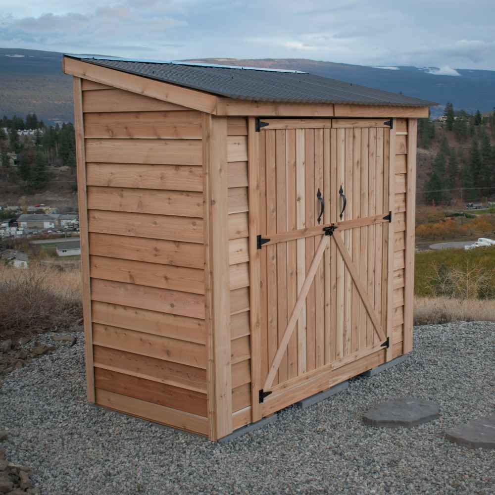 Double Door Metal Roof Outdoor Living Today 8×4 SpaceSaver Lean-To Cedar Shed is shown at an angle with its slanted metal roof and double sliding cedar doors