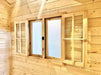 Double wooden windows with clear glass and protective outer shutters are featured inside the Sawmill Structures The Jumbo Grand Loft 130 SD Garden Room