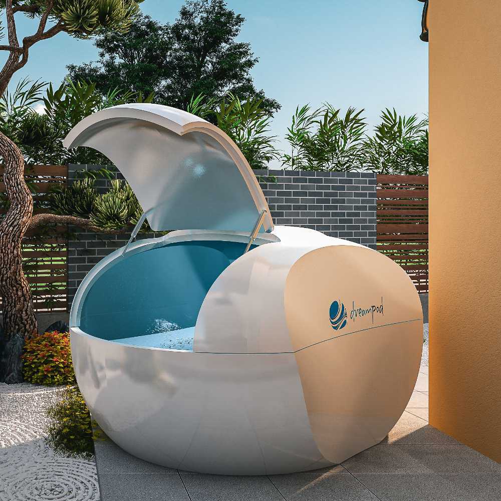 Dreampod Home Float Plus is open on a tiled patio revealing a blue interior