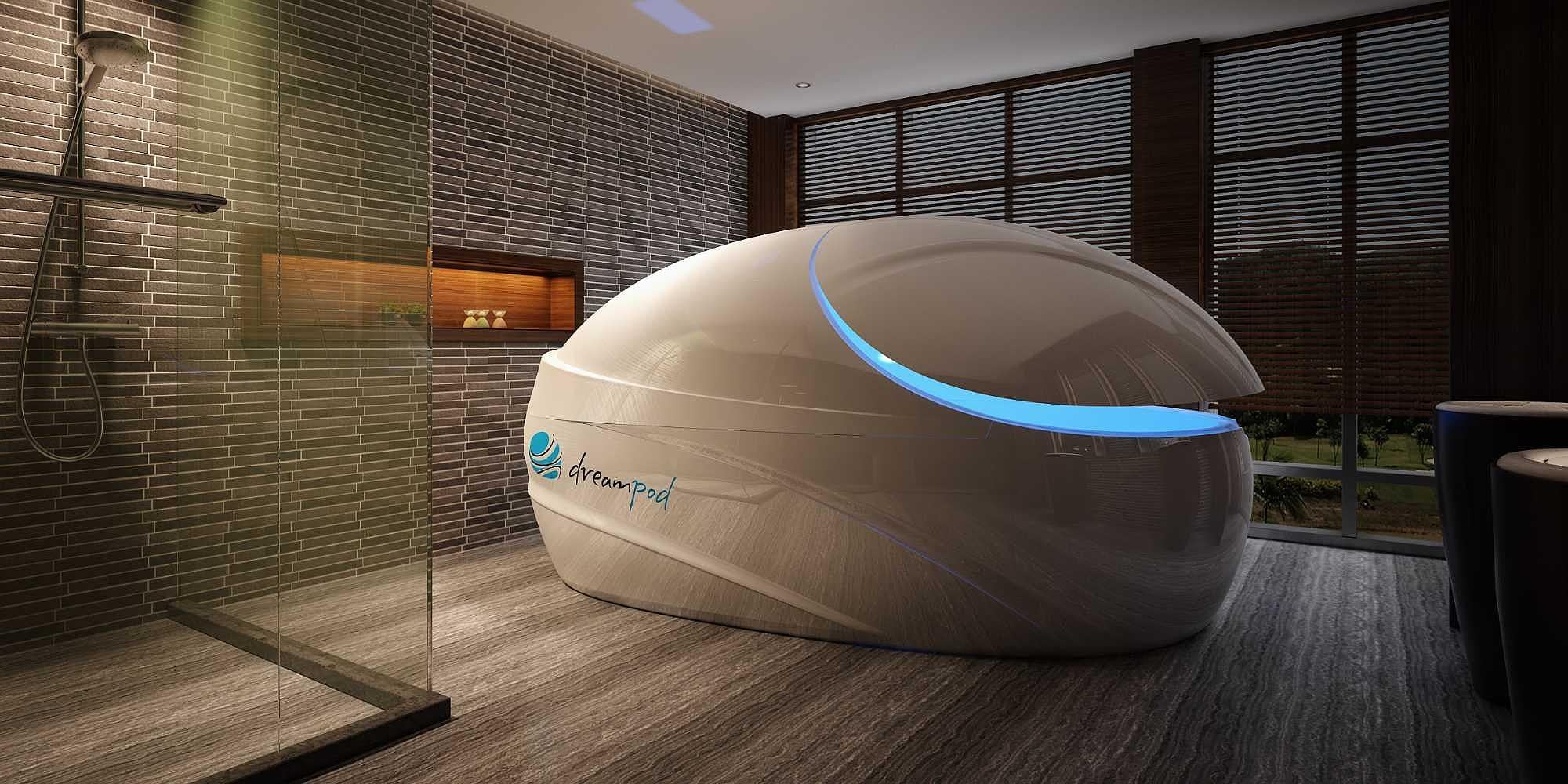 Dreampod Vmax Float Pod in a dimly lit, stylish bathroom