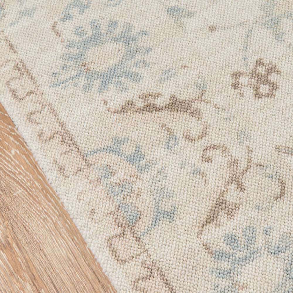 Edge detail of Momeni Anatolia Indoor Rug - ANA-5 Beige displays its intricate woven border and fine craftsmanship