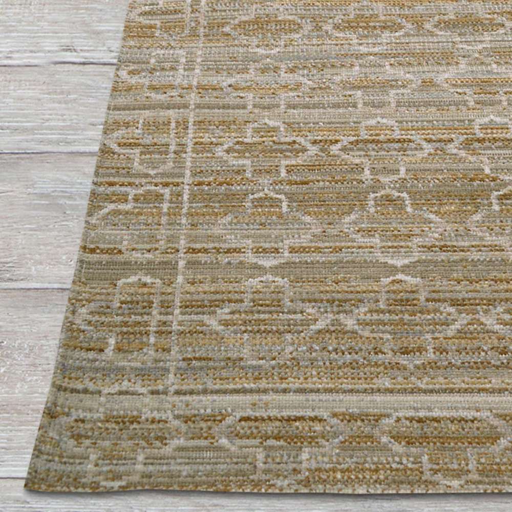 Edge of Couristan Fez Indoor/Outdoor Rug - Riad/Sand is shown, highlighting its neat border and repeating sand-colored pattern