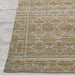 Edge of Couristan Fez Indoor/Outdoor Rug - Riad/Sand is shown, highlighting its neat border and repeating sand-colored pattern