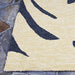 Edge of the Couristan Covington Indoor/Outdoor Rug - Palms/Navy highlights the thick, looped texture and dark palm fronds