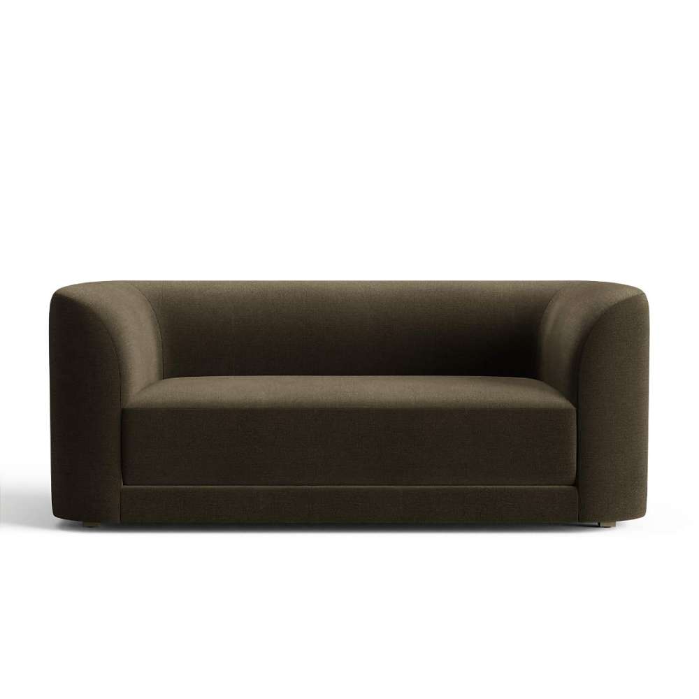 Fabric Conifer (Tesoro Velvet) Crate & Barrel Contour Sofa upholstered in deep conifer green velvet with curved arms, a broad seat cushion, and a sleek modern silhouette