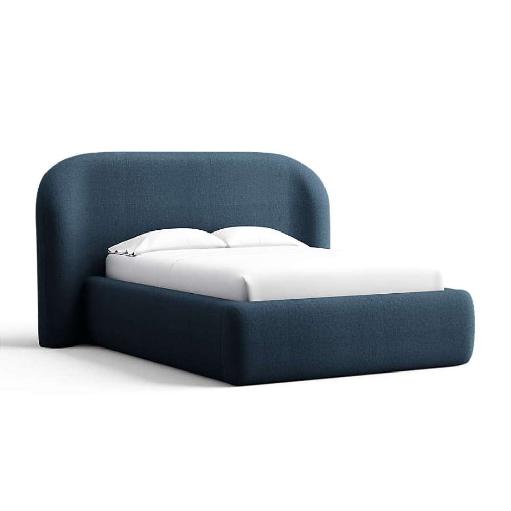 Fabric Navy (Linen Linen Weave) Crate & Barrel Adelaide Curved Upholstered Bed in navy linen upholstery with a rounded headboard and soft upholstered frame