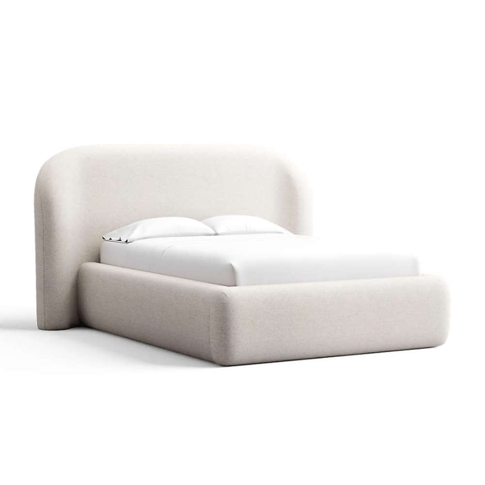 Fabric Oatmeal (Serene Textured Weave) Crate & Barrel Adelaide Curved Upholstered Bed wrapped in oatmeal textured fabric with a curved headboard and plush platform