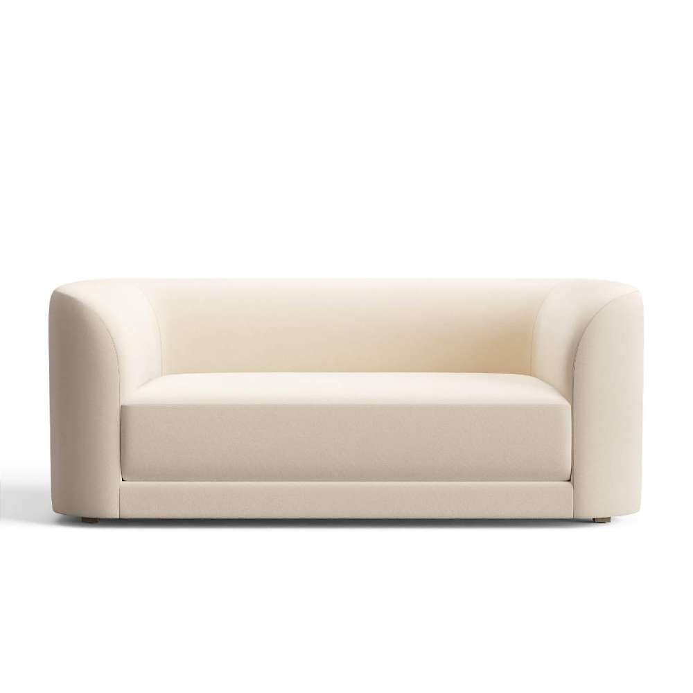 Fabric Porcelain (Tesoro Velvet) Crate & Barrel Contour Sofa featuring porcelain white velvet upholstery, curved arms, and a sleek minimalist design