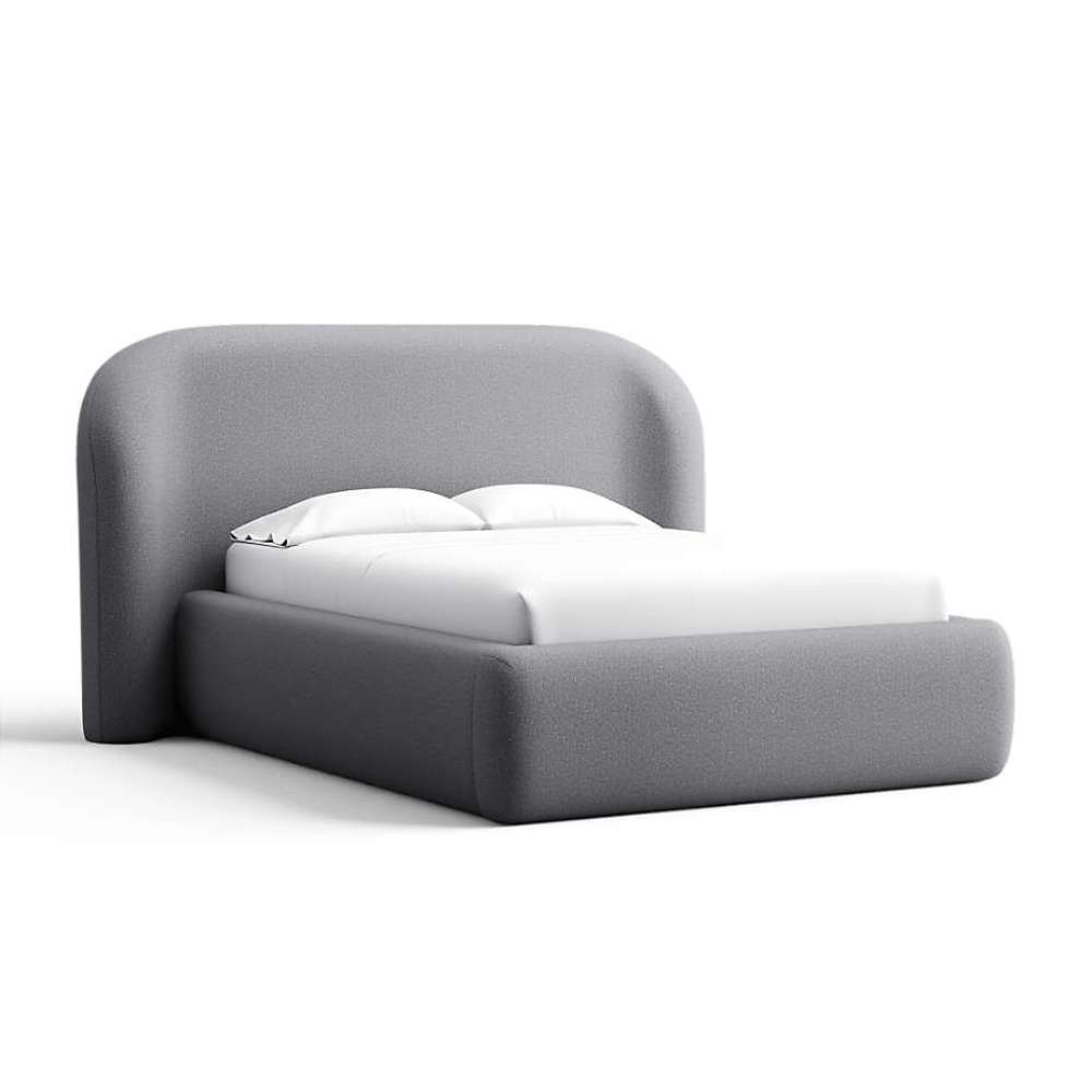 Fabric Quarry (Icon Chenille) Crate & Barrel Adelaide Curved Upholstered Bed upholstered in quarry gray chenille with a rounded headboard and fully upholstered frame